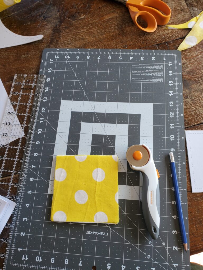 cut squares and other quilting supplies